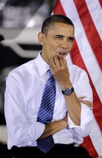 Obama Keeps the Faith on His Blackberry